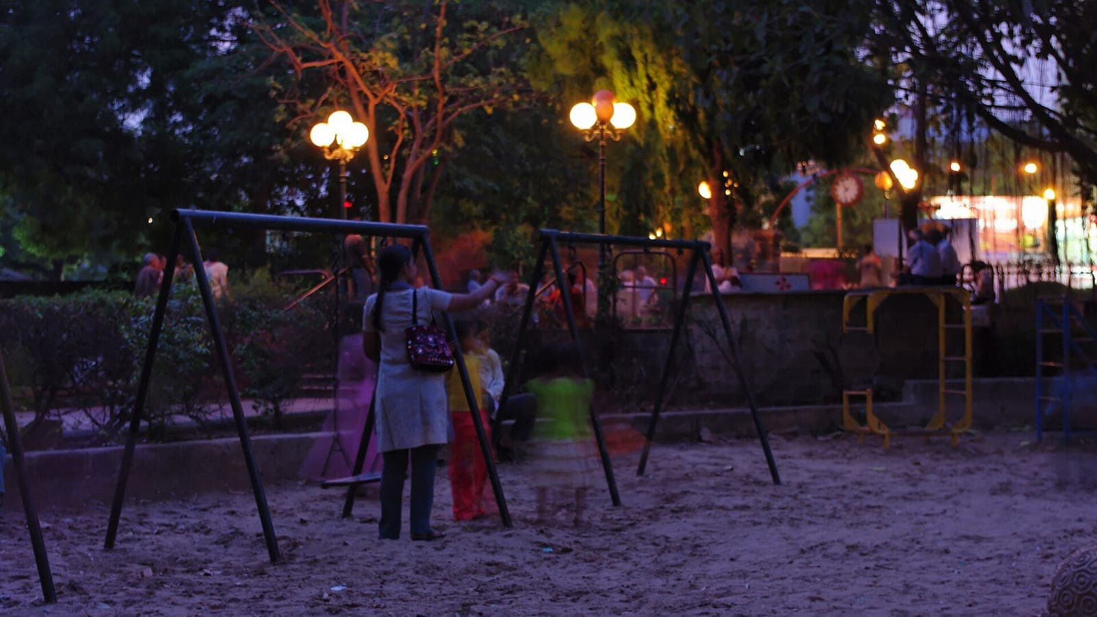 Law Garden market in Ahmedabad in the evening, stalls lit by strings of bulbs